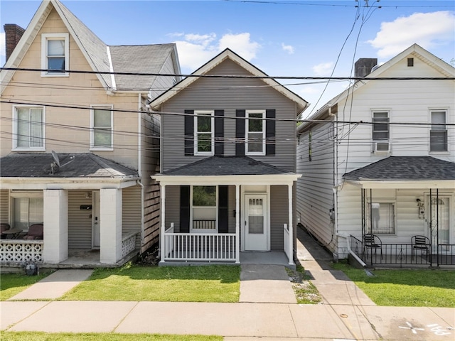 815 W Main St, Carnegie, PA 15106 - view of front of home with a porch and a chimney