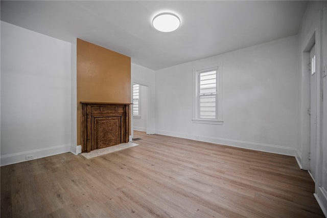 815 W Main St, Carnegie, PA 15106 - unfurnished living room with light wood finished floors and baseboards