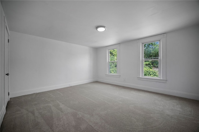 815 W Main St, Carnegie, PA 15106 - empty room with carpet flooring and baseboards