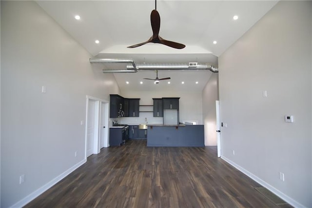 2040 Constitution Blvd, Elizabeth Twp/Boro, PA 15135 - unfurnished living room with a ceiling fan, dark wood-style floors, recessed lighting, baseboards, and high vaulted ceiling