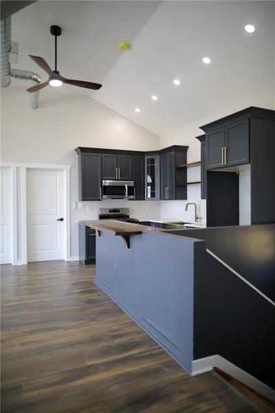 2040 Constitution Blvd, Elizabeth Twp/Boro, PA 15135 - kitchen featuring appliances with stainless steel finishes, ceiling fan, recessed lighting, dark wood-style flooring, and glass insert cabinets