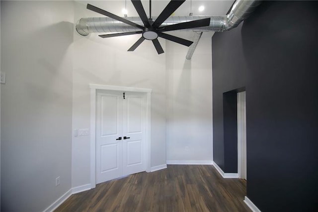 2040 Constitution Blvd, Elizabeth Twp/Boro, PA 15135 - unfurnished room with a towering ceiling, dark wood finished floors, a ceiling fan, and baseboards