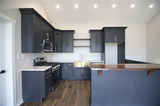 2040 Constitution Blvd, Elizabeth Twp/Boro, PA 15135 - kitchen with stainless steel appliances, a sink, dark wood finished floors, recessed lighting, and a kitchen bar
