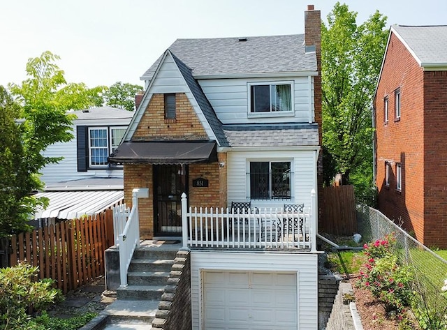 851 Kennebec St, Greenfield, PA 15217 - view of front facade featuring an attached garage, roof with shingles, and a chimney