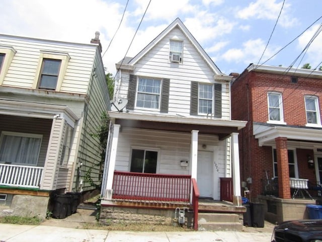 1220 Thelma St, Marshall Shadeland, PA 15212 - view of front facade with covered porch and cooling unit