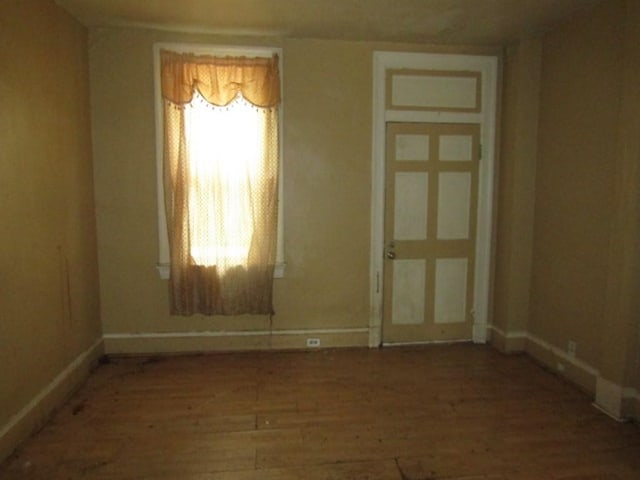 1220 Thelma St, Marshall Shadeland, PA 15212 - empty room featuring baseboards and wood finished floors