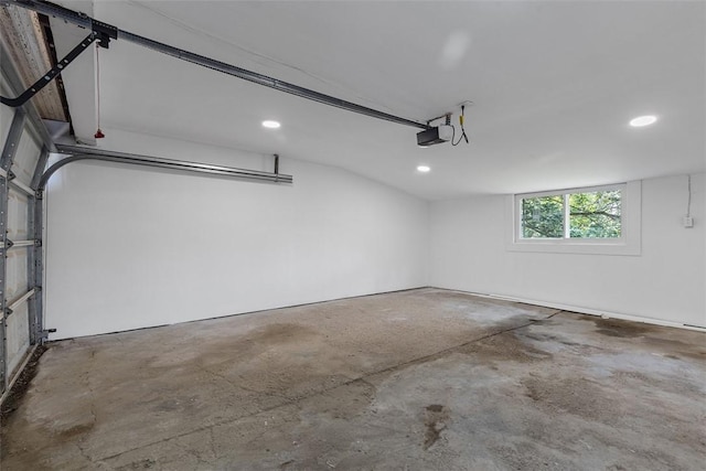 8952 Eastwood Rd, Penn Hills, PA 15235 - garage featuring a garage door opener and recessed lighting