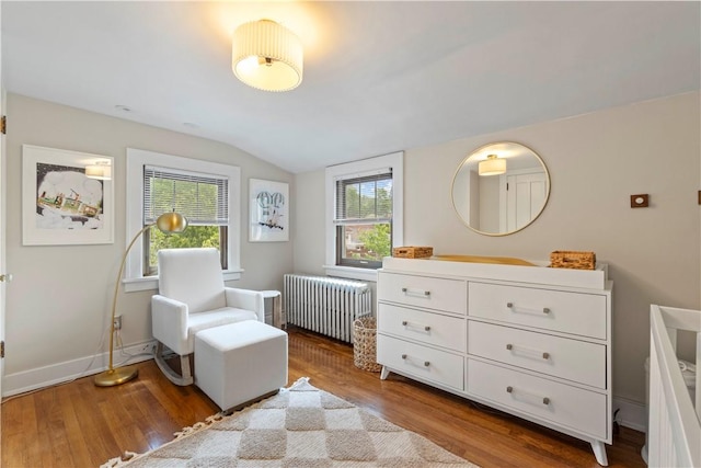 503 6th St, Oakmont, PA 15139 - bedroom featuring radiator heating unit, vaulted ceiling, wood finished floors, and baseboards