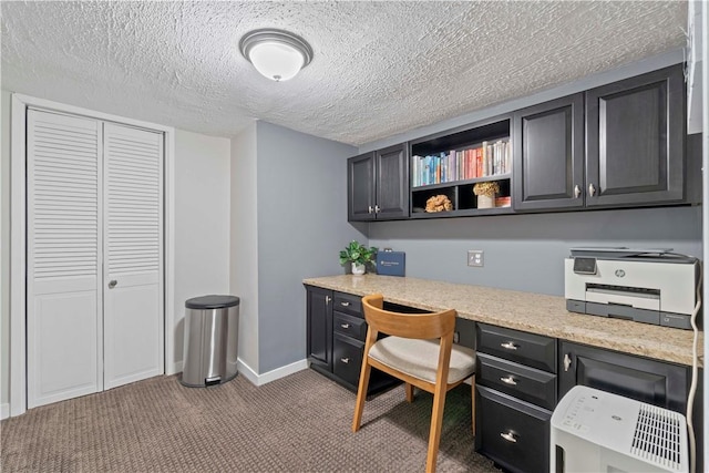 503 6th St, Oakmont, PA 15139 - office space with built in desk, carpet flooring, a textured ceiling, and baseboards