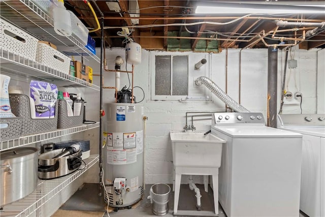 503 6th St, Oakmont, PA 15139 - laundry room featuring water heater and washer and clothes dryer