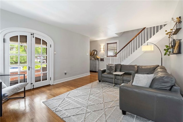 503 6th St, Oakmont, PA 15139 - living area with wood finished floors, plenty of natural light, and stairs