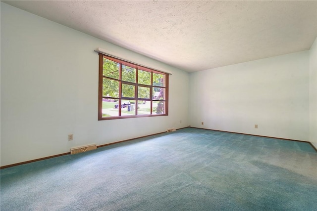 662 Huntington Dr, Cranberry Twp, PA 16066 - empty room featuring carpet flooring and a textured ceiling