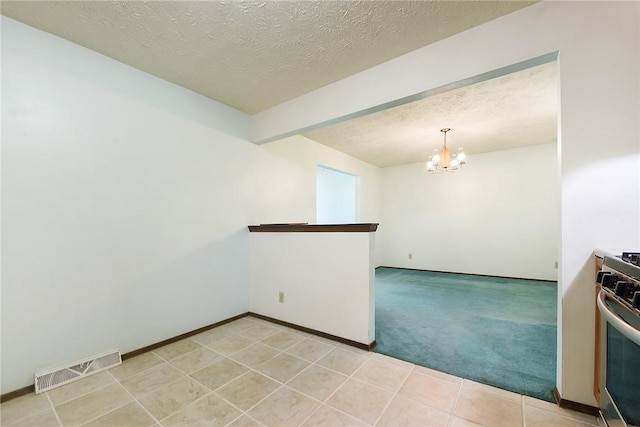 662 Huntington Dr, Cranberry Twp, PA 16066 - unfurnished room with a chandelier, a textured ceiling, and light carpet