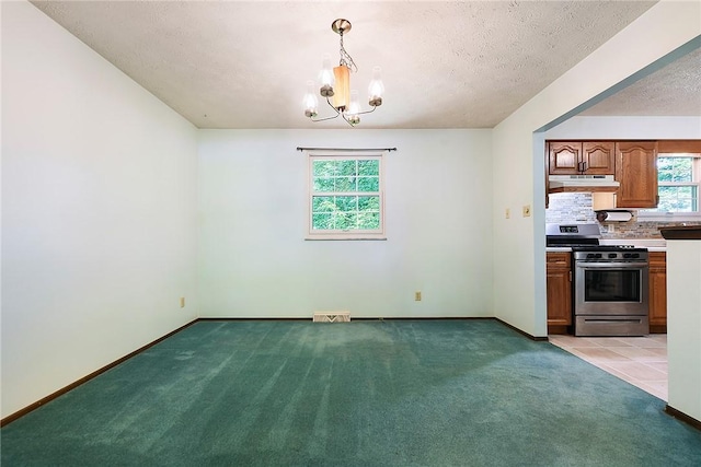 662 Huntington Dr, Cranberry Twp, PA 16066 - unfurnished dining area featuring light carpet, a chandelier, and a textured ceiling