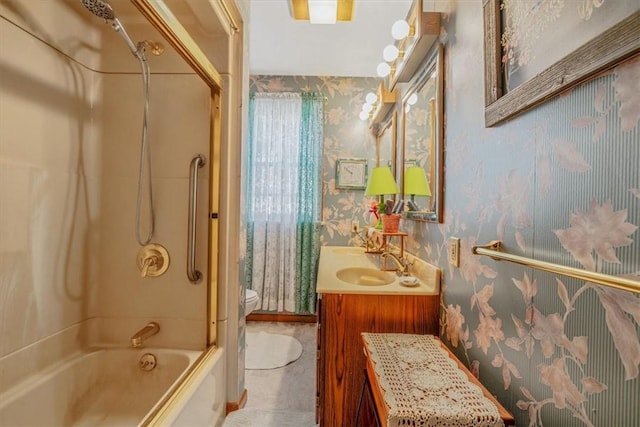 306 Meadow Ave, Charleroi Boro, PA 15022 - bathroom with wallpapered walls, toilet, shower / bathtub combination, and double vanity