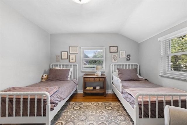 752 Washington, Ross Twp, PA 15229 - bedroom featuring wood finished floors and vaulted ceiling