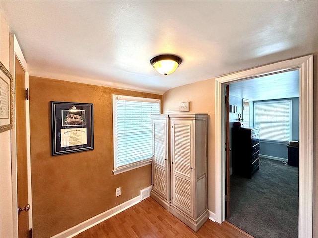104 Kenneth Ave, Neshannock Twp, PA 16105 - bedroom with wood finished floors, multiple windows, and baseboards