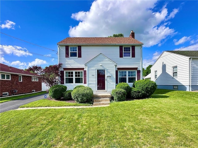 104 Kenneth Ave, Neshannock Twp, PA 16105 - view of front of property with a chimney and a front lawn