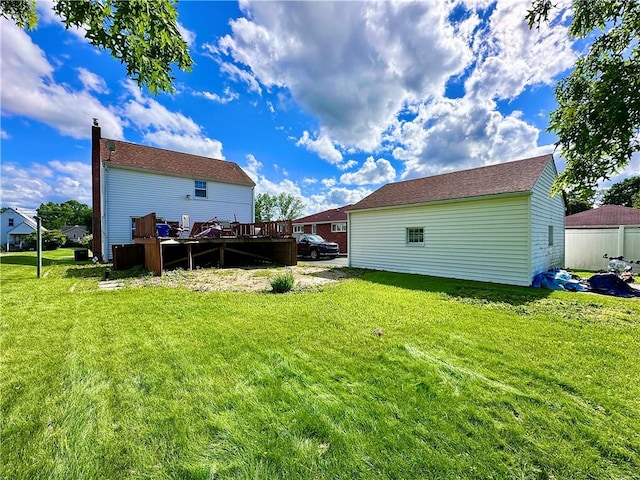 104 Kenneth Ave, Neshannock Twp, PA 16105 - back of property with a lawn, a deck, and a chimney