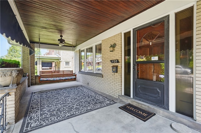 1150 Morningside Ave, Morningside, PA 15206 - entrance to property featuring a porch, brick siding, and ceiling fan