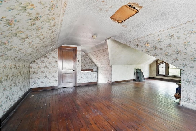1150 Morningside Ave, Morningside, PA 15206 - bonus room with wallpapered walls, wood-type flooring, vaulted ceiling, and baseboards