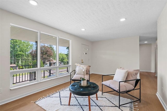 507 Edgehill Dr, Richland, PA 15044 - sitting room with plenty of natural light, a textured ceiling, wood finished floors, baseboards, and recessed lighting