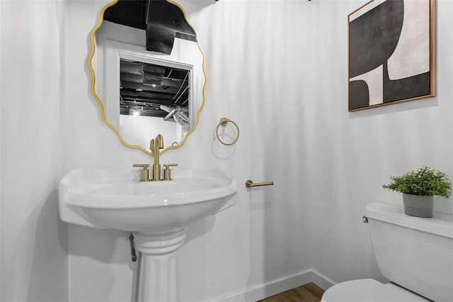507 Edgehill Dr, Richland, PA 15044 - half bathroom featuring toilet, wood finished floors, and baseboards