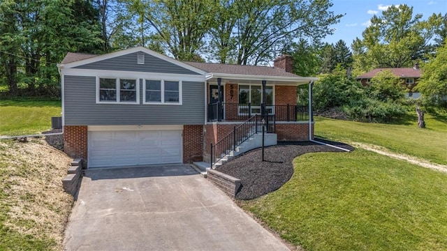 507 Edgehill Dr, Richland, PA 15044 - ranch-style house featuring brick siding, driveway, a front lawn, covered porch, and a garage