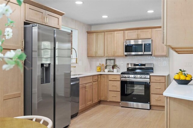 507 Edgehill Dr, Richland, PA 15044 - kitchen with appliances with stainless steel finishes, light brown cabinetry, light wood-style flooring, light countertops, and recessed lighting