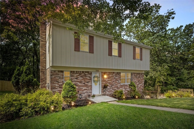 765 Brookshire Dr, Mccandless, PA 15237 - colonial inspired home featuring a front lawn, a chimney, and brick siding