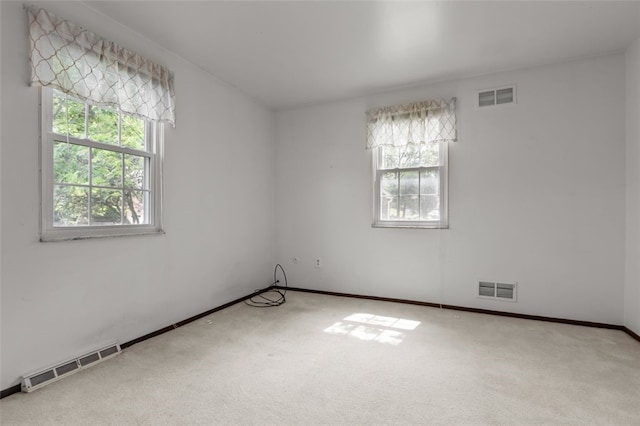 765 Brookshire Dr, Mccandless, PA 15237 - unfurnished room featuring plenty of natural light, carpet, and baseboards