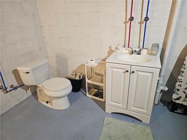 1099 Vine St, Coraopolis, PA 15108 - bathroom featuring finished concrete flooring, toilet, and vanity