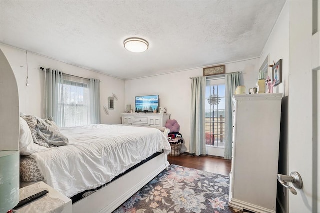 155 Pride Dr, Rostraver, PA 15012 - bedroom featuring wood finished floors and a textured ceiling