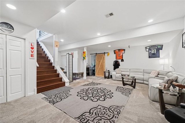 155 Pride Dr, Rostraver, PA 15012 - living area featuring a barn door, stairs, light colored carpet, and recessed lighting