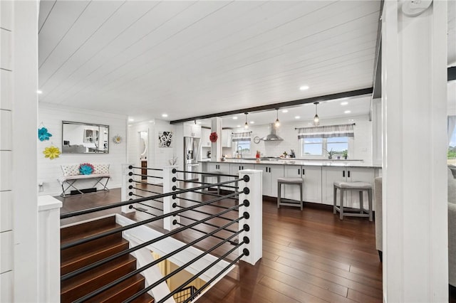 155 Pride Dr, Rostraver, PA 15012 - corridor featuring dark wood-style flooring, an upstairs landing, and recessed lighting