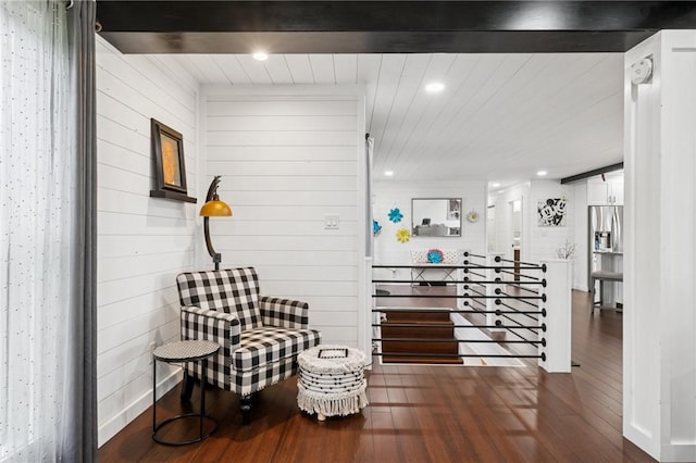 155 Pride Dr, Rostraver, PA 15012 - living area featuring dark wood-type flooring, recessed lighting, and wood walls