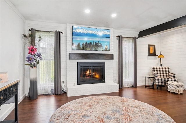 155 Pride Dr, Rostraver, PA 15012 - living area featuring wood finished floors, a fireplace, and recessed lighting