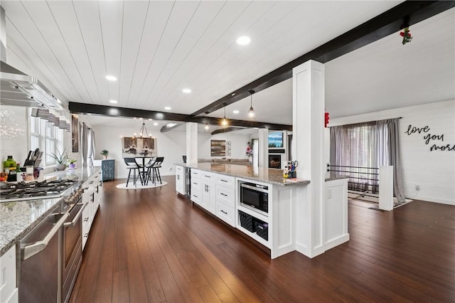155 Pride Dr, Rostraver, PA 15012 - kitchen with built in microwave, dark wood-type flooring, white cabinetry, light stone countertops, and recessed lighting