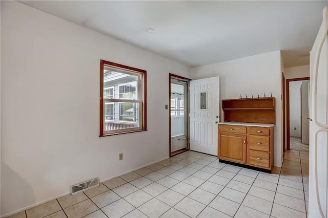 952 Seybertown Rd, Perry Twp, PA 16041 - foyer entrance with light tile patterned floors and baseboards