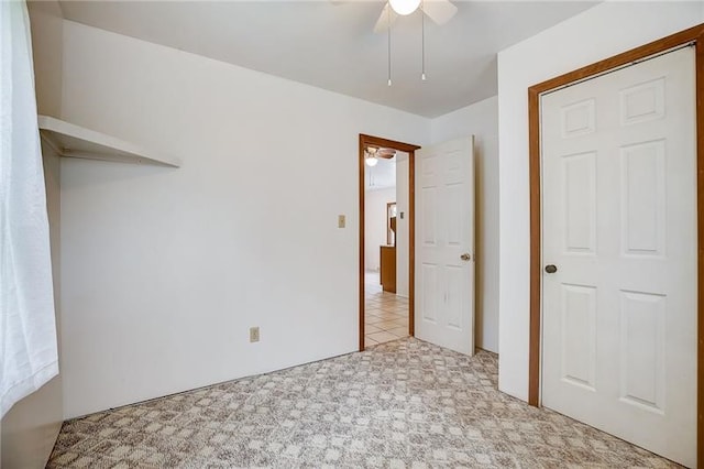 952 Seybertown Rd, Perry Twp, PA 16041 - unfurnished bedroom with carpet and ceiling fan