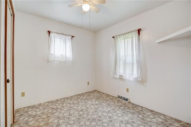 952 Seybertown Rd, Perry Twp, PA 16041 - unfurnished room with healthy amount of natural light, ceiling fan, and carpet