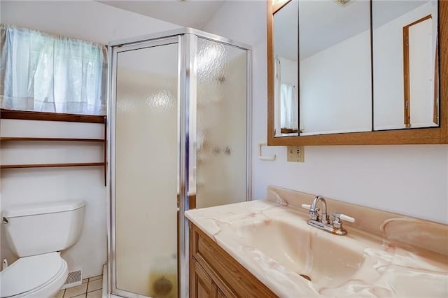 952 Seybertown Rd, Perry Twp, PA 16041 - bathroom with vanity, toilet, a shower stall, and tile patterned floors