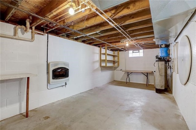 952 Seybertown Rd, Perry Twp, PA 16041 - basement with heating unit, water heater, and concrete block wall