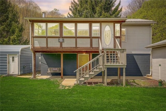 952 Seybertown Rd, Perry Twp, PA 16041 - rear view of house with a lawn