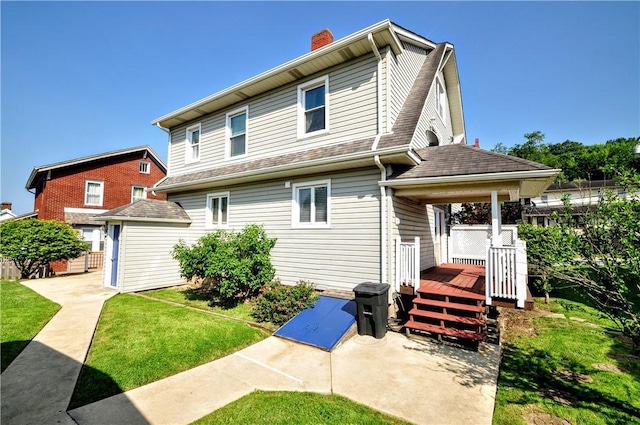 232 Center Ave, Elizabeth Twp/Boro, PA 15037 - back of property with a chimney and a wooden deck