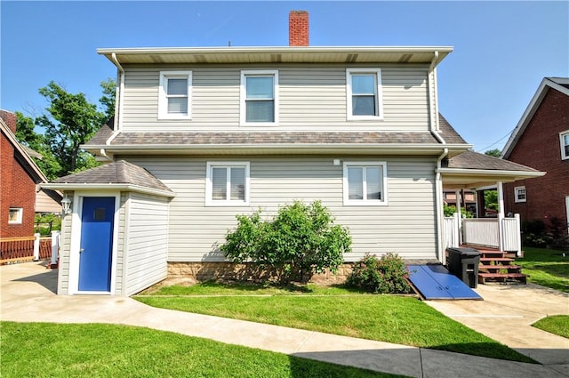 232 Center Ave, Elizabeth Twp/Boro, PA 15037 - back of property featuring a yard, a chimney, and an outdoor structure