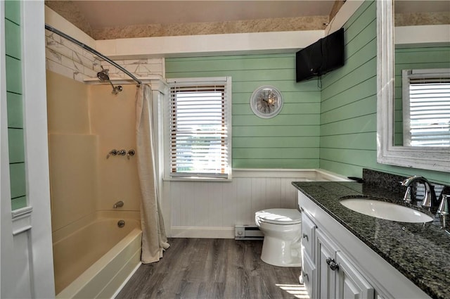 232 Center Ave, Elizabeth Twp/Boro, PA 15037 - full bath with wood finished floors, shower / tub combo with curtain, vanity, toilet, and wooden walls