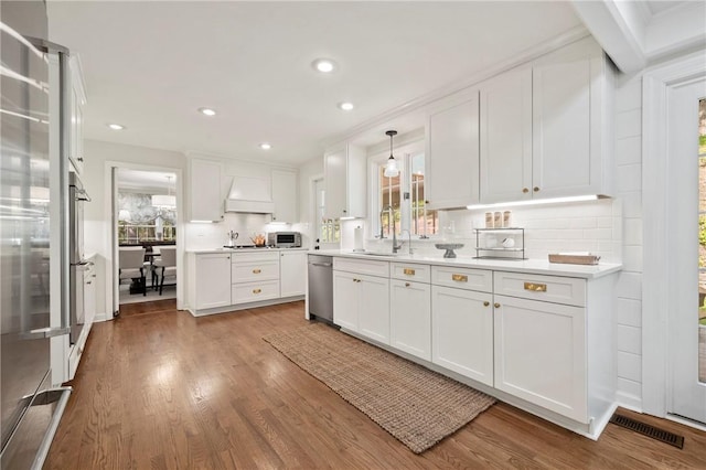 306 Wildberry Rd, Fox Chapel, PA 15238 - kitchen featuring stainless steel appliances, premium range hood, white cabinetry, and recessed lighting