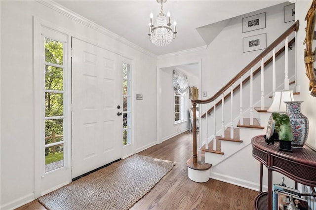 306 Wildberry Rd, Fox Chapel, PA 15238 - foyer featuring a chandelier, stairs, wood finished floors, crown molding, and baseboards