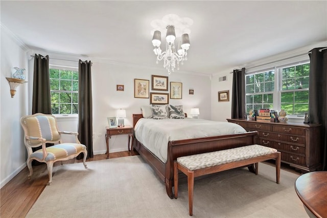 306 Wildberry Rd, Fox Chapel, PA 15238 - bedroom featuring light wood-style floors, a chandelier, crown molding, and baseboards